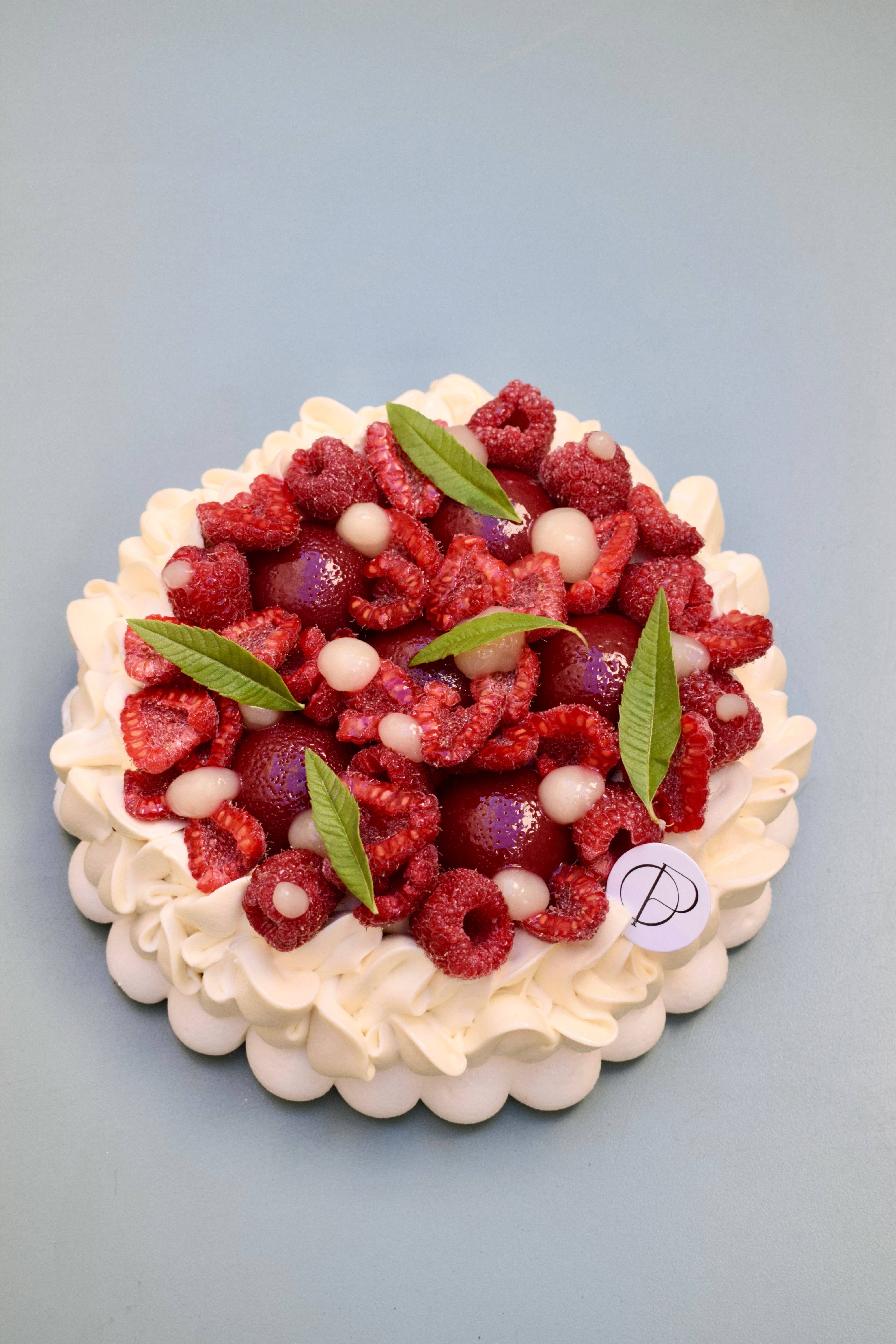 Pavlova yuzu, framboise & verveine